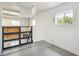 Loft area with access to downstairs and three windows at 18355 W 59Th Dr, Golden, CO 80403