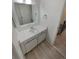 Bathroom with a white vanity and a large mirror at 3552 S Kittredge St # C, Aurora, CO 80013