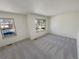 Bedroom with carpeted floors and natural light from two windows at 3552 S Kittredge St # C, Aurora, CO 80013