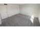 Cozy bedroom with neutral carpet, spacious closet, and ample natural light at 3552 S Kittredge St # C, Aurora, CO 80013