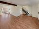 Open-concept living room with wood floors and natural light at 3552 S Kittredge St # C, Aurora, CO 80013