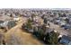 Residential homes with a backdrop of a community trail and green space in a well-maintained neighborhood at 9683 Las Colinas Dr, Lone Tree, CO 80124