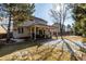 Expansive backyard featuring a covered patio, perfect for outdoor gatherings at 9683 Las Colinas Dr, Lone Tree, CO 80124