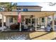 Inviting backyard with a covered patio area perfect for outdoor dining and relaxation at 9683 Las Colinas Dr, Lone Tree, CO 80124