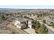 Aerial view of a home surrounded by trees and landscape at 2116 Ridgetrail Dr, Castle Rock, CO 80104