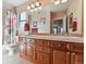 Bathroom featuring double sinks, a large mirror and plenty of cabinetry for ample storage space at 2116 Ridgetrail Dr, Castle Rock, CO 80104