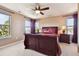 Tranquil bedroom with scenic views and a spacious layout, bathed in natural light at 2116 Ridgetrail Dr, Castle Rock, CO 80104