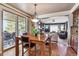 Dining area with hardwood floors, a sliding door, and open to the living room at 2116 Ridgetrail Dr, Castle Rock, CO 80104