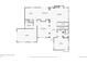 Floorplan including kitchen, living room, dining room, and garage at 2116 Ridgetrail Dr, Castle Rock, CO 80104