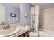Well-lit bathroom featuring a shower-tub combo, and single sink at 8233 E 149Th Dr, Thornton, CO 80602
