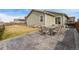 Backyard with stamped concrete patio perfect for entertaining guests at 350 Mesa Ave, Lochbuie, CO 80603