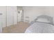 Comfortable ' bedroom features plush carpeting and neutral paint at 350 Mesa Ave, Lochbuie, CO 80603