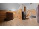 Bedroom showcasing rustic wood paneling, a built-in safe, and a comfortable sleeping area at 356 Castlewood Dr, Evergreen, CO 80439