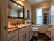 Bathroom with a framed mirror, a granite countertop, and tile flooring at 8908 Jellison Ct, Westminster, CO 80021