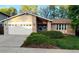 Inviting single-Gathering home features a two-car garage and beautiful landscaping, creating a welcoming curb appeal at 8908 Jellison Ct, Westminster, CO 80021