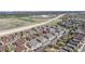 Expansive aerial shot of a residential area with modern apartments, green spaces, and convenient highway access at 4630 Copeland Cir # 201, Highlands Ranch, CO 80126