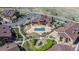 Aerial view of the community clubhouse, playground and pool; all surrounded by condos at 4630 Copeland Cir # 201, Highlands Ranch, CO 80126