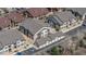 Elevated view of modern apartment buildings with ample parking and well-kept grounds in a residential area at 4630 Copeland Cir # 201, Highlands Ranch, CO 80126