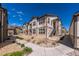 Well-maintained apartment complex with sidewalks, tidy landscaping, and a clear blue sky in a residential area at 4630 Copeland Cir # 201, Highlands Ranch, CO 80126