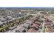 Aerial view of a sprawling residential community, showcasing diverse homes and a vibrant neighborhood layout at 4630 Copeland Cir # 201, Highlands Ranch, CO 80126
