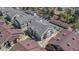 Aerial view of a well-maintained apartment complex with organized parking and landscaping in a suburban setting at 4630 Copeland Cir # 201, Highlands Ranch, CO 80126