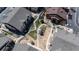 Aerial view of a meticulously landscaped courtyard with walkways, gardens, and charming architectural details at 4630 Copeland Cir # 201, Highlands Ranch, CO 80126
