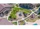 Overhead shot of a central neighborhood playground with walking paths and picnic area at 4630 Copeland Cir # 201, Highlands Ranch, CO 80126