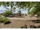 Community playground surrounded by mature trees, featuring playground with slides and benches at 4630 Copeland Cir # 201, Highlands Ranch, CO 80126