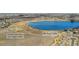 Aerial view of McKay Lake, open lands and park, with residential area in the background at 13463 Quivas St, Westminster, CO 80234