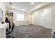Finished basement with gray carpet and closet, perfect for entertaining or relaxing at 13463 Quivas St, Westminster, CO 80234