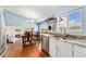 Cozy dining area with hardwood floors and ample natural light at 13463 Quivas St, Westminster, CO 80234