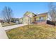 Inviting two-story home with a well-maintained lawn and a cozy front porch at 13463 Quivas St, Westminster, CO 80234