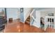 Inviting entryway with hardwood floors and a view of the staircase at 13463 Quivas St, Westminster, CO 80234