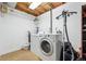 Functional laundry room with modern washer and dryer, providing convenience and efficiency at 13463 Quivas St, Westminster, CO 80234