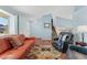 Cozy living room with hardwood floors, comfortable seating, and ample natural light at 13463 Quivas St, Westminster, CO 80234