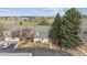 An aerial view of the property and a view of the golf course at 2182 S Victor St # D, Aurora, CO 80014