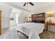 Spacious bedroom with large bed, plush carpeting, and ample natural light at 2182 S Victor St # D, Aurora, CO 80014