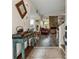 Inviting foyer with decorative wood accents, opening into a spacious living area with a fireplace at 2182 S Victor St # D, Aurora, CO 80014