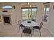 Inviting dining area with views, a sliding door, and a modern table setting at 9568 W San Juan Cir # 307, Littleton, CO 80128