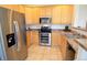 Updated kitchen featuring stainless steel appliances and light wood cabinetry at 9568 W San Juan Cir # 307, Littleton, CO 80128
