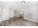 Inviting entryway with hardwood floors, white doors, and neutral decor at 1500 Buckeye Cir, Georgetown, CO 80444