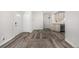 Inviting entryway with hardwood floors, white doors, and neutral decor at 1500 Buckeye Cir, Georgetown, CO 80444
