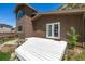 Exterior of home featuring a white deck and beautiful mountain views at 1500 Buckeye Cir, Georgetown, CO 80444