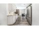 Modern kitchen with stainless appliances that opens to living area at 1500 Buckeye Cir, Georgetown, CO 80444