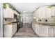 Bright kitchen features granite countertops, stainless steel appliances, subway tile backsplash, and wood-look flooring at 1500 Buckeye Cir, Georgetown, CO 80444