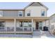 Charming two-story home with inviting back porch and manicured yard at 12965 Grassland St, Longmont, CO 80504