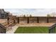 Spacious backyard features a well-maintained lawn and a wooden fence at 12965 Grassland St, Longmont, CO 80504
