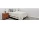 Cozy bedroom with a comfortable bed and a classic wood nightstand at 12965 Grassland St, Longmont, CO 80504