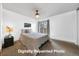 Bright bedroom with a plush bed, soft carpet, natural light, and peaceful view, creating a serene retreat at 5773 W 76Th Dr, Arvada, CO 80003