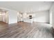 Large open floor plan showcasing the kitchen and living area, perfect for entertaining at 2186 Flower Blossom Ave, Brighton, CO 80601